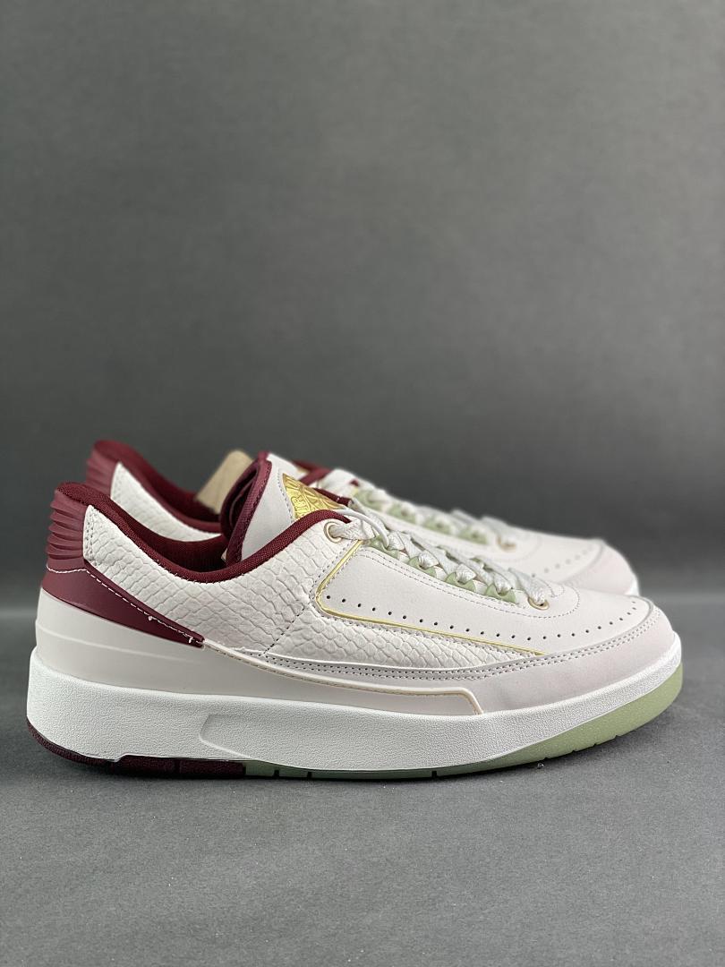 Air Jordan 2 Retro Low A Ma Maniére 'Airness' Sail Burgundy Crush White Maroon Gold Green DO4055-161 Limited Edition Collaboration Sneakers