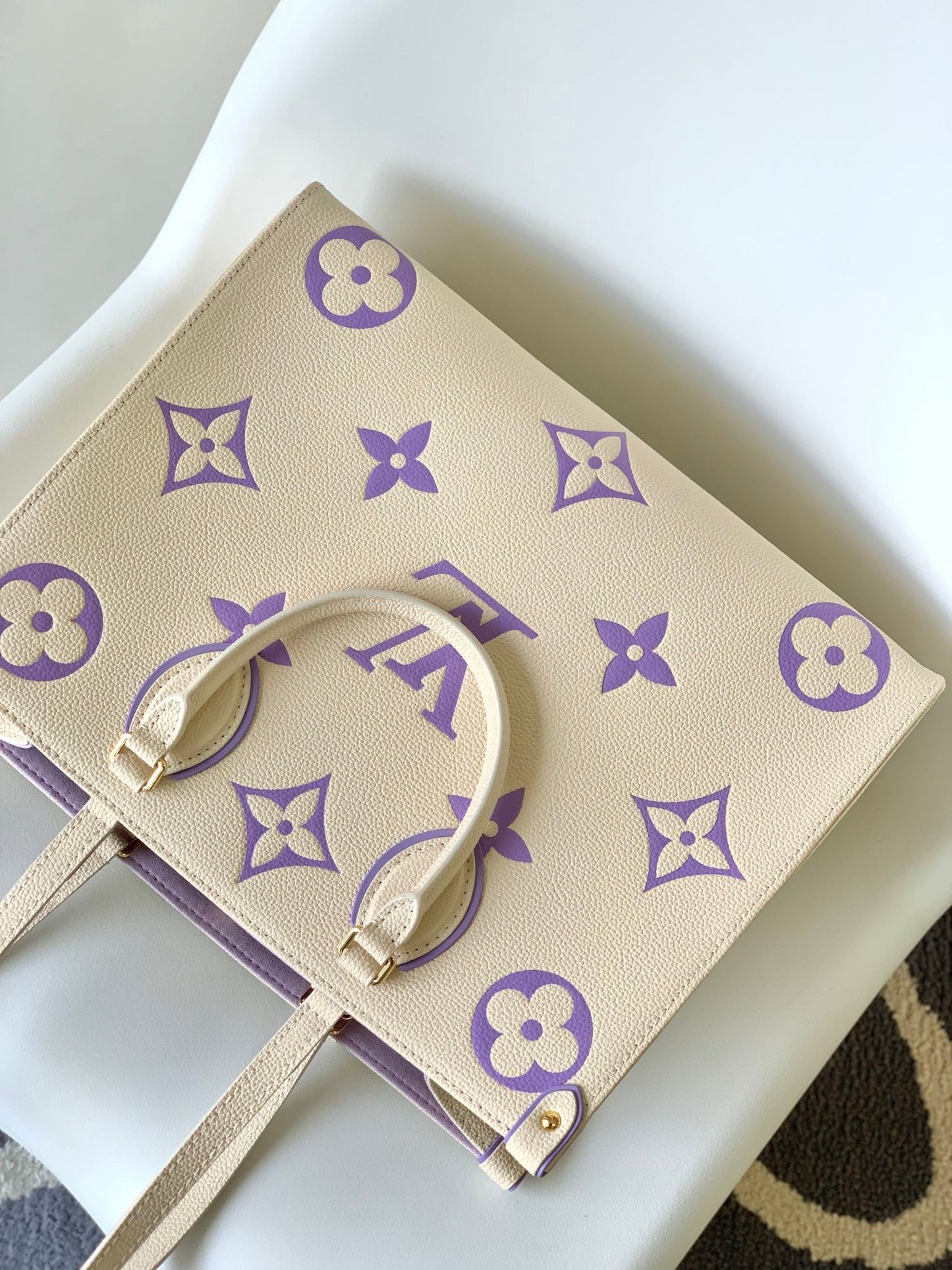 Louis Vuitton Elegant Cream Leather Tote Bag with Purple Monogram Print