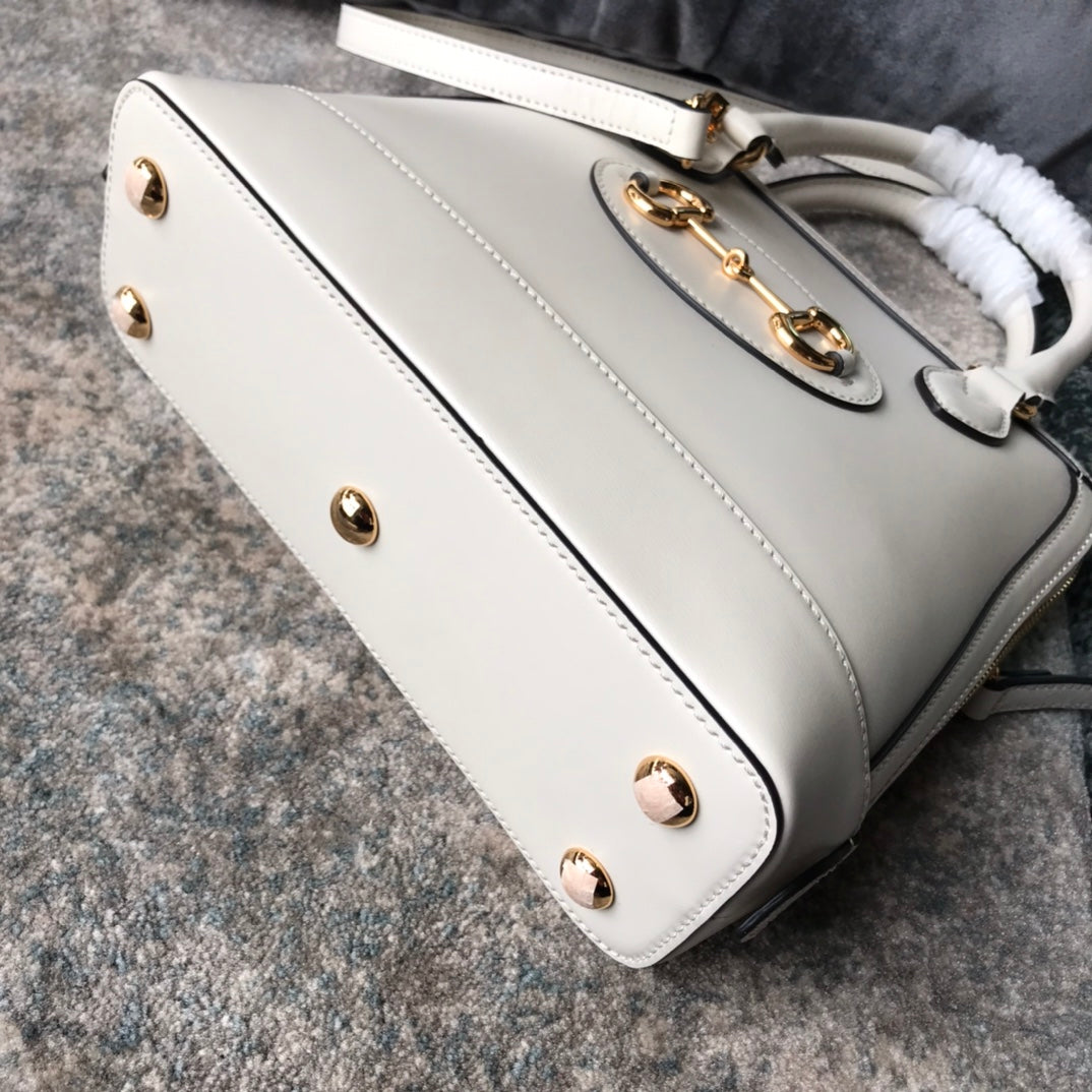Gucci Elegant Off-White Leather Top Handle Bag with Horsebit Hardware