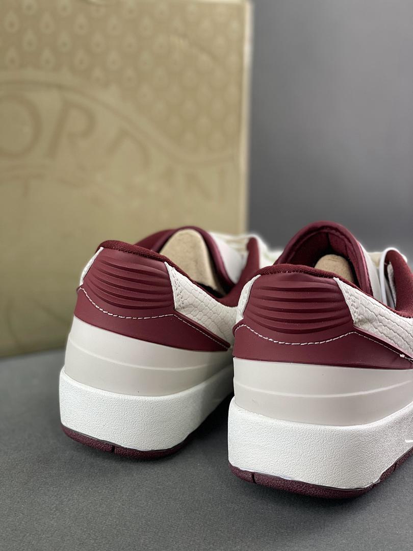 Air Jordan 2 Retro Low A Ma Maniére 'Airness' Sail Burgundy Crush White Maroon Gold Green DO4055-161 Limited Edition Collaboration Sneakers