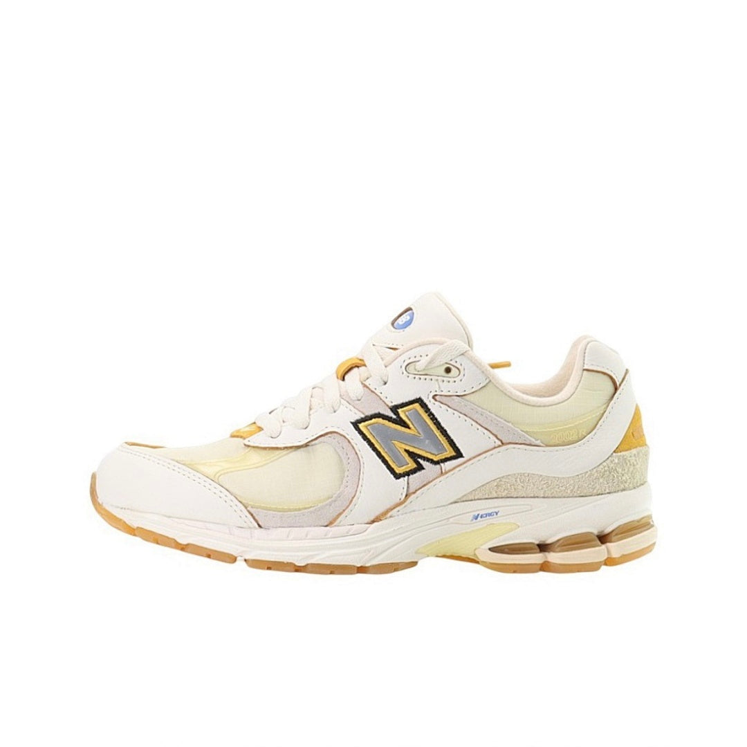 New Balance 2002R Angora Phantom Gold Metallic Cream Yellow M2002RDD Men's Lifestyle Sneakers