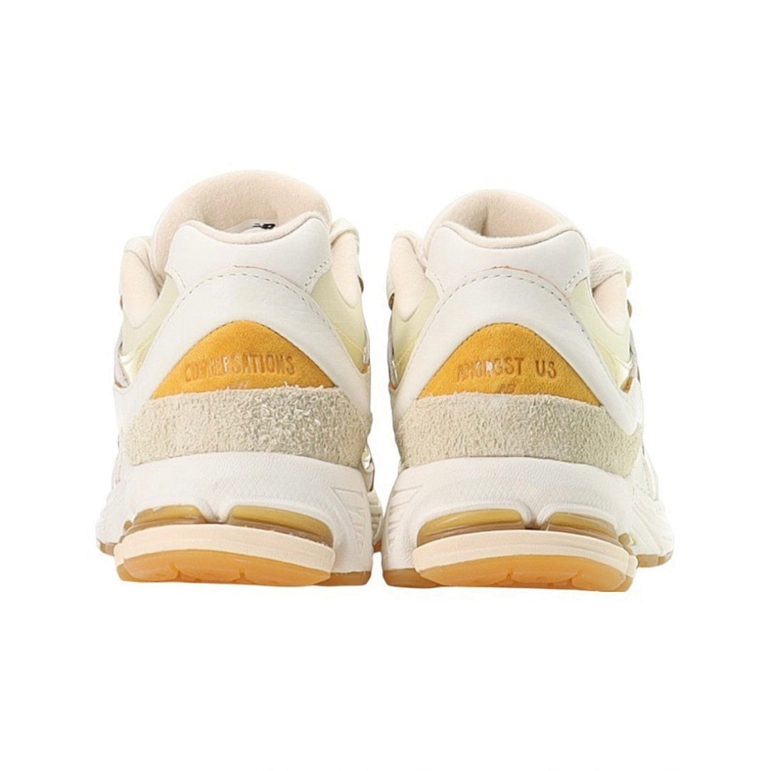 New Balance 2002R Angora Phantom Gold Metallic Cream Yellow M2002RDD Men's Lifestyle Sneakers