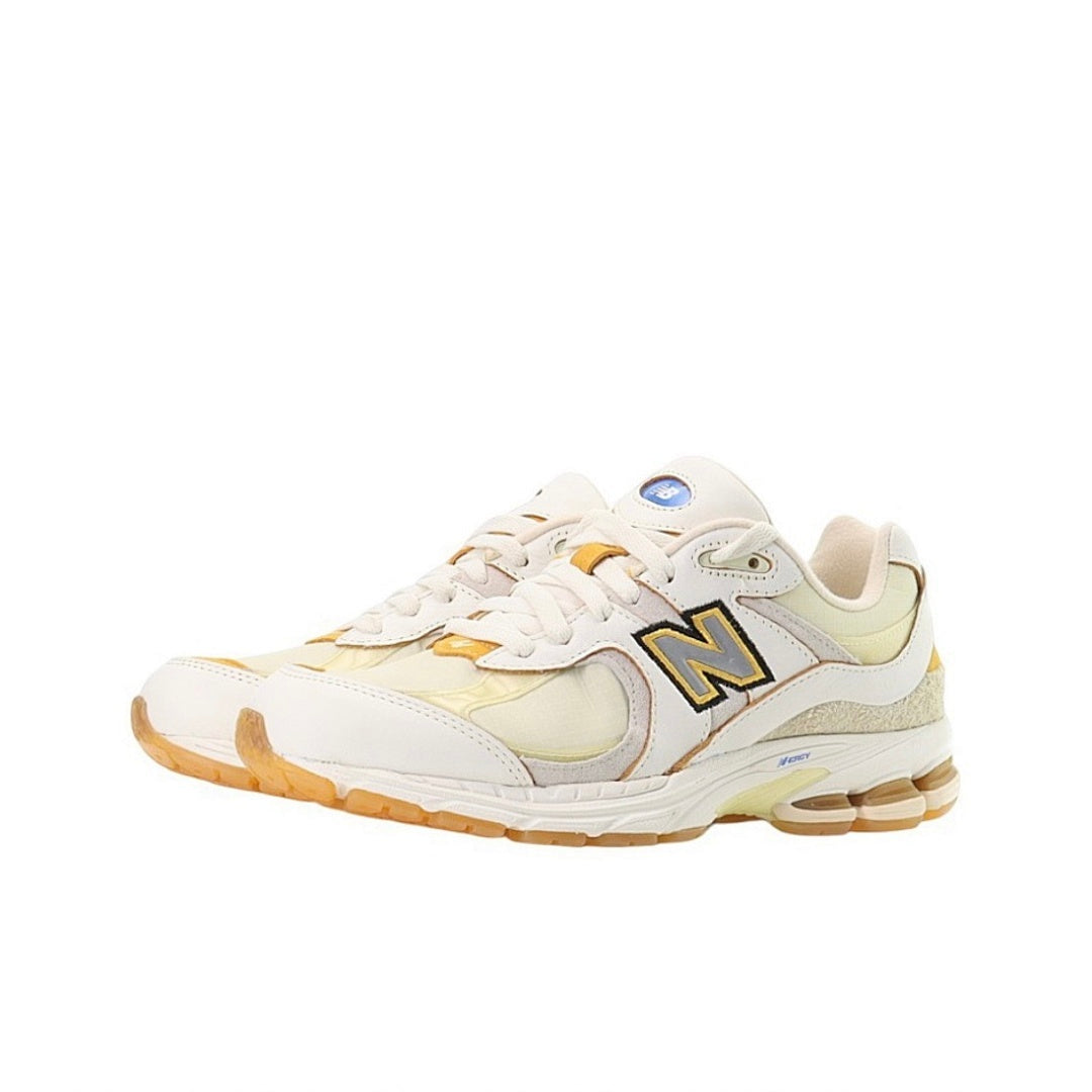 New Balance 2002R Angora Phantom Gold Metallic Cream Yellow M2002RDD Men's Lifestyle Sneakers