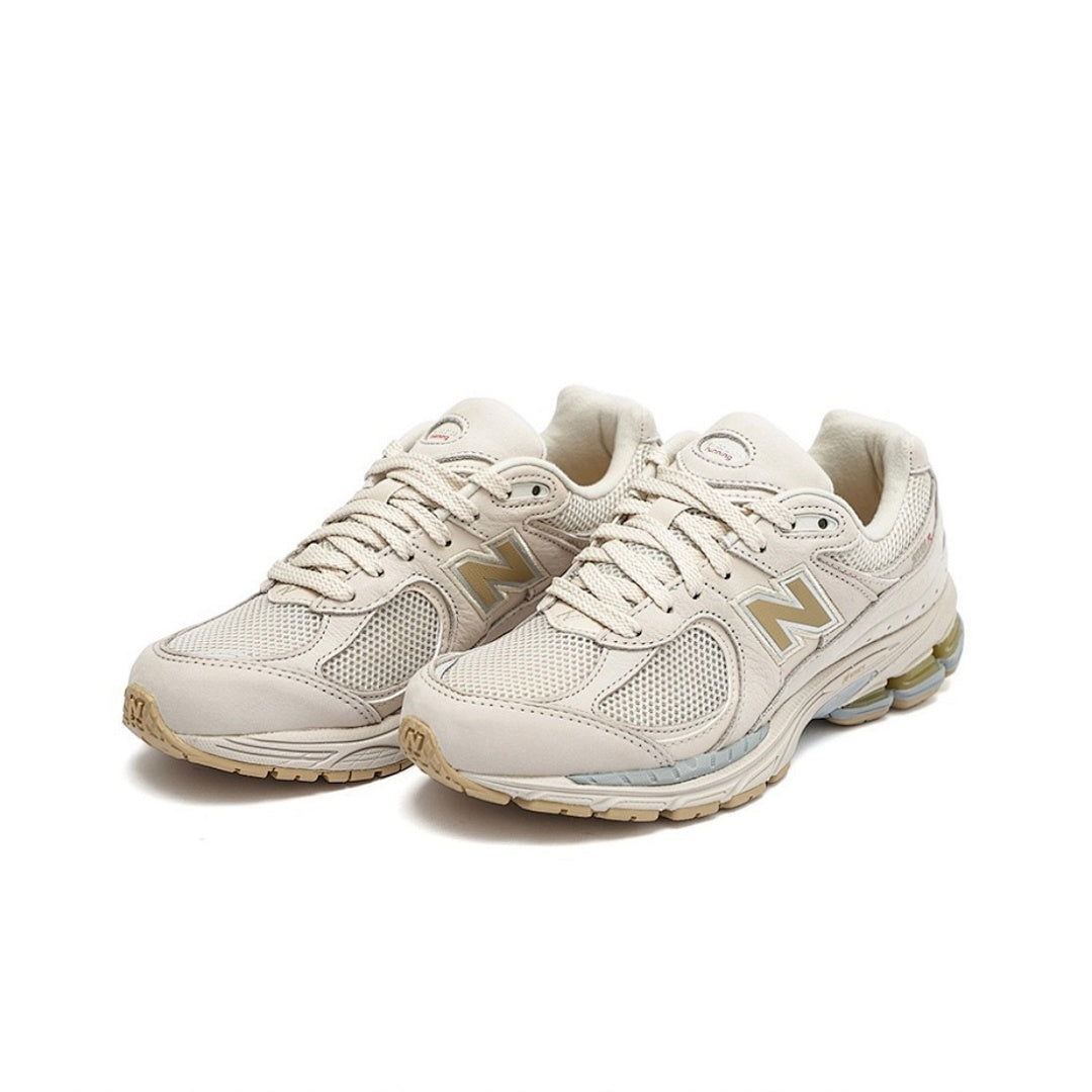 New Balance 2002R Sea Salt Gold Metallic M2002RHO Lifestyle Sneakers Shoes Cream Off-White Unisex