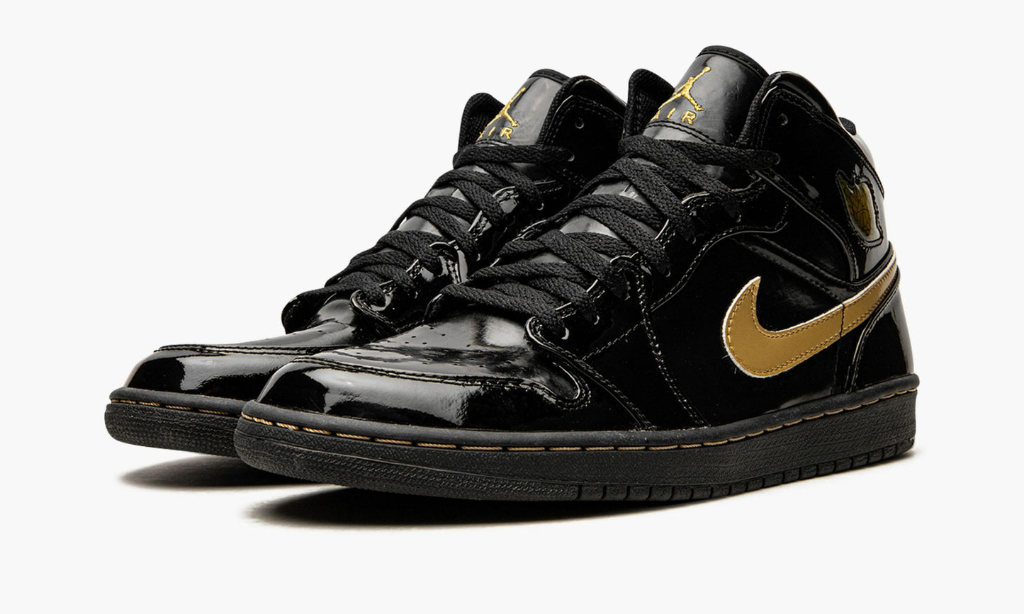 Air Jordan 1 Retro Black Metallic Gold ( 2003 )