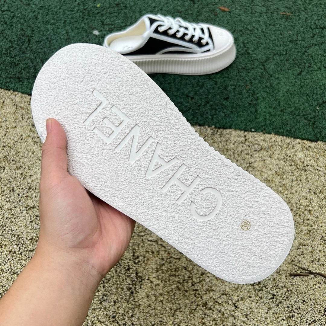 CHANEL Mules in Canvas, White & Black G43690 X56531 K4004