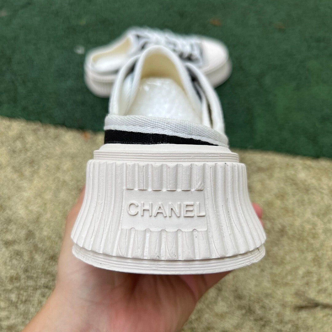 CHANEL Mules in Canvas, White & Black G43690 X56531 K4004