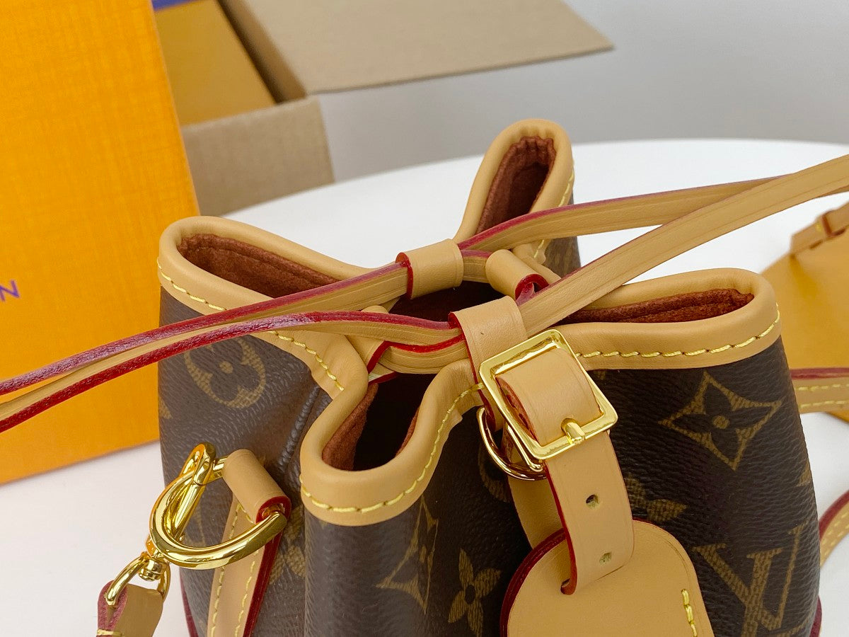 Louis Vuitton Vintage Brown Monogram Mini Bucket Bag with Tan Leather Trim