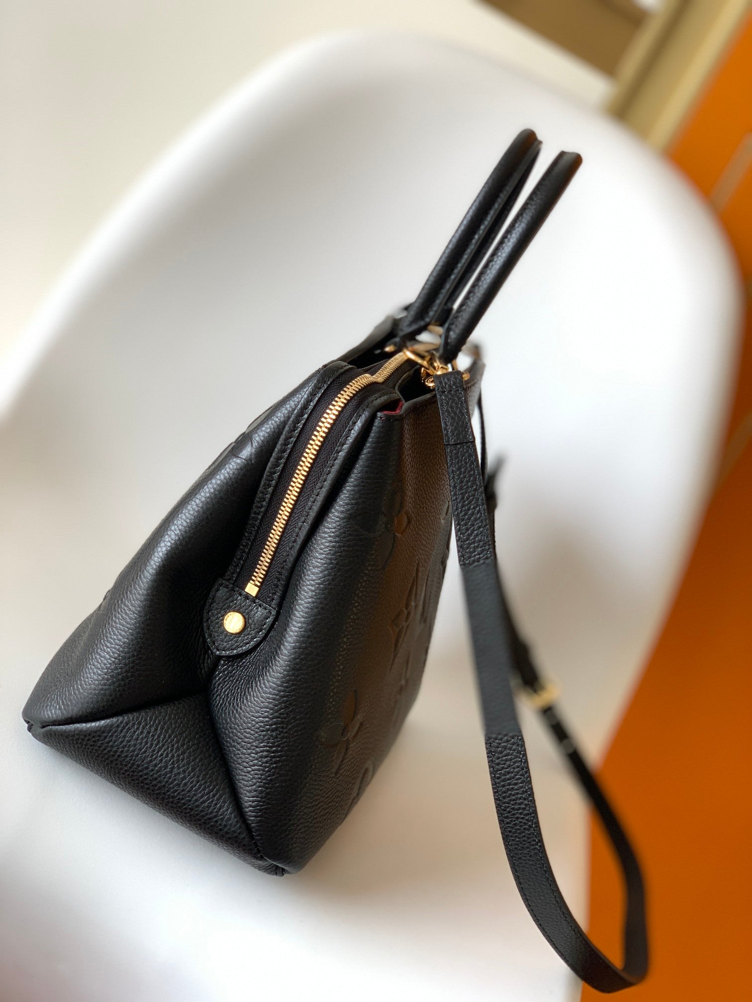 Louis Vuitton Elegant Black Embossed Leather Top Handle Satchel Bag