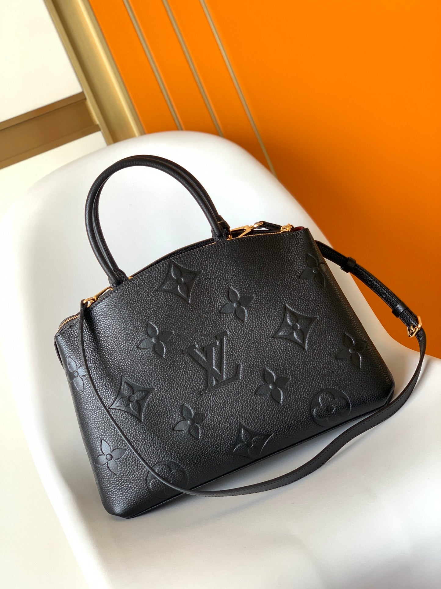 Louis Vuitton Elegant Black Embossed Leather Top Handle Satchel Bag