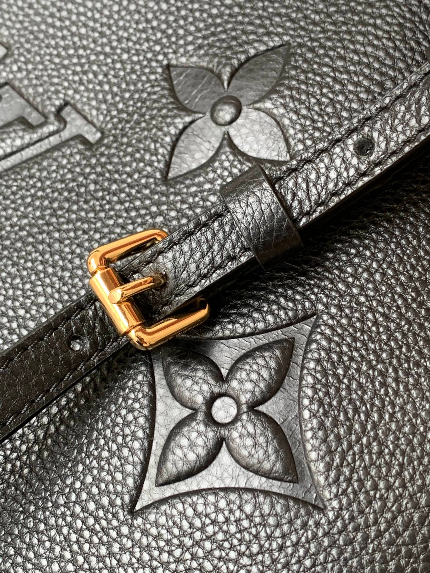 Louis Vuitton Elegant Black Embossed Leather Top Handle Satchel Bag