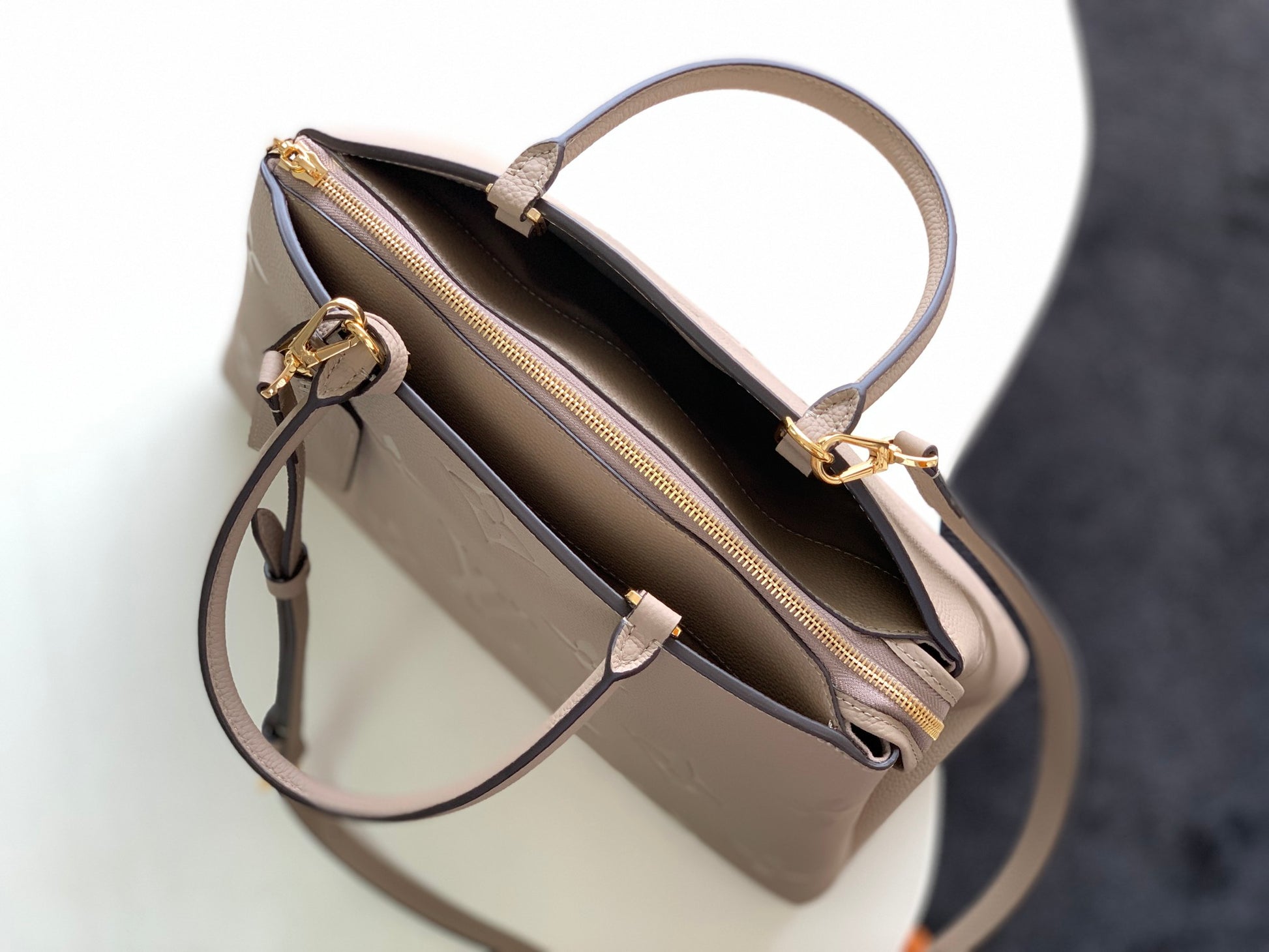 Louis Vuitton Elegant Taupe Embossed Leather Satchel Handbag with Lock Charm