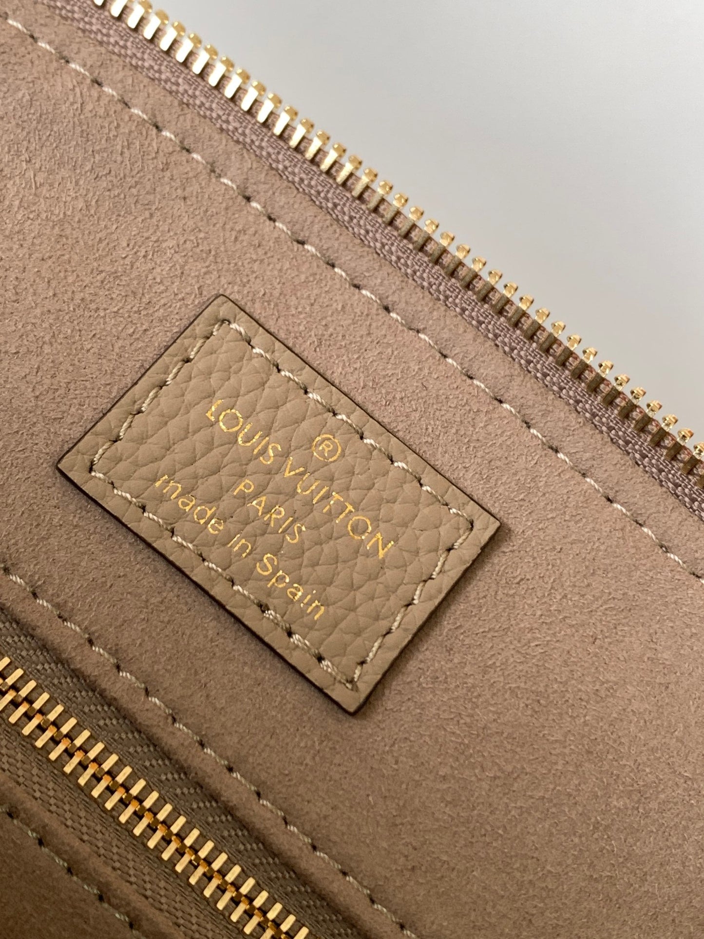 Louis Vuitton Elegant Taupe Embossed Leather Satchel Handbag with Lock Charm