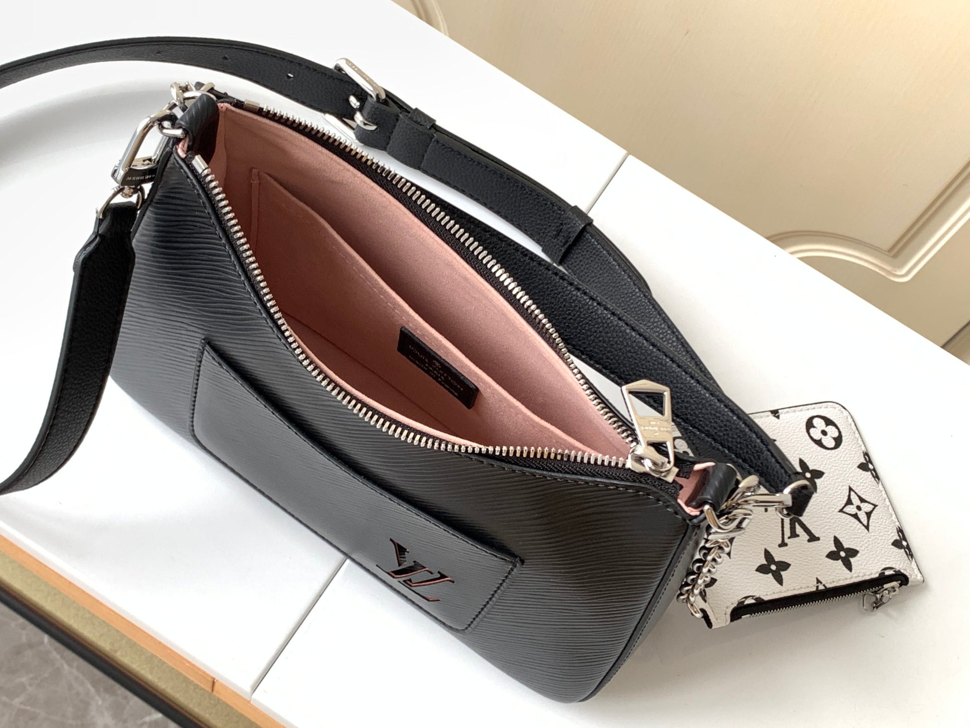 Louis Vuitton Elegant Black Embossed Leather Hobo Shoulder Bag with Pouch