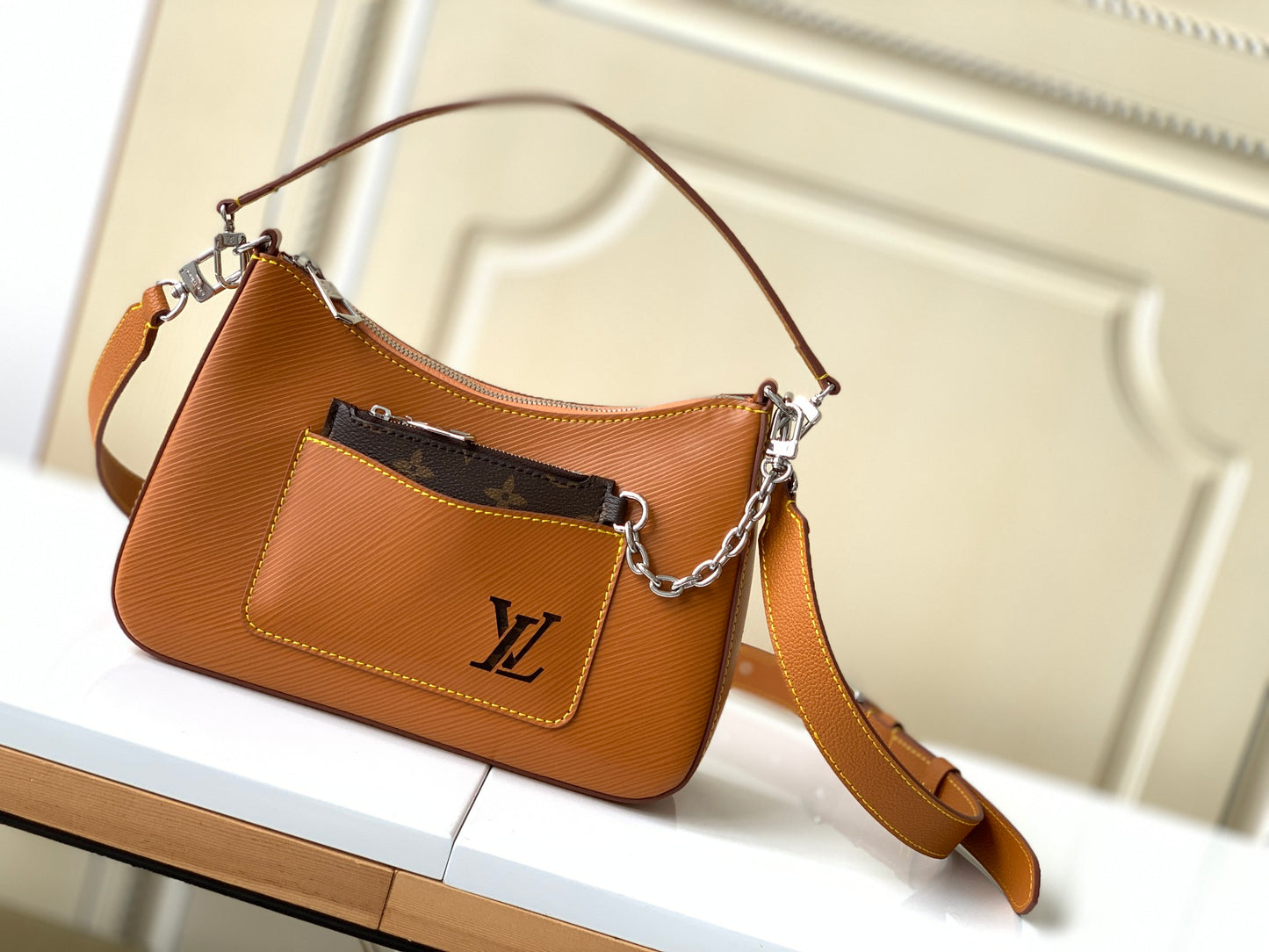 Louis Vuitton Tan Leather Shoulder Bag with Front Pocket and Chain Detail
