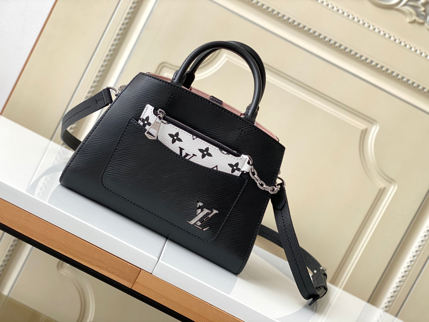 Louis Vuitton Black Top Handle Handbag with Silver Chain and Patterned Front Pocket