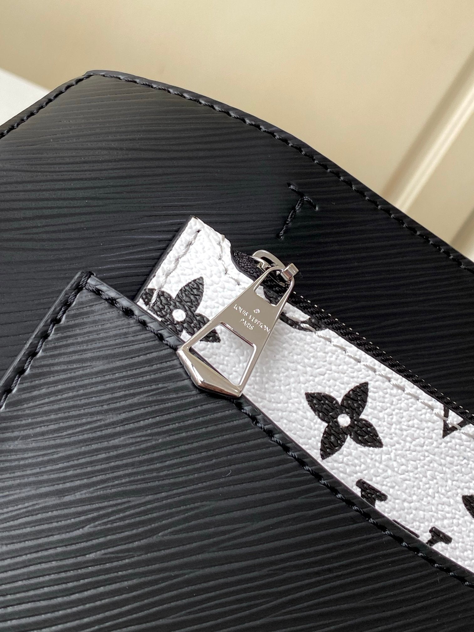 Louis Vuitton Black Top Handle Handbag with Silver Chain and Patterned Front Pocket