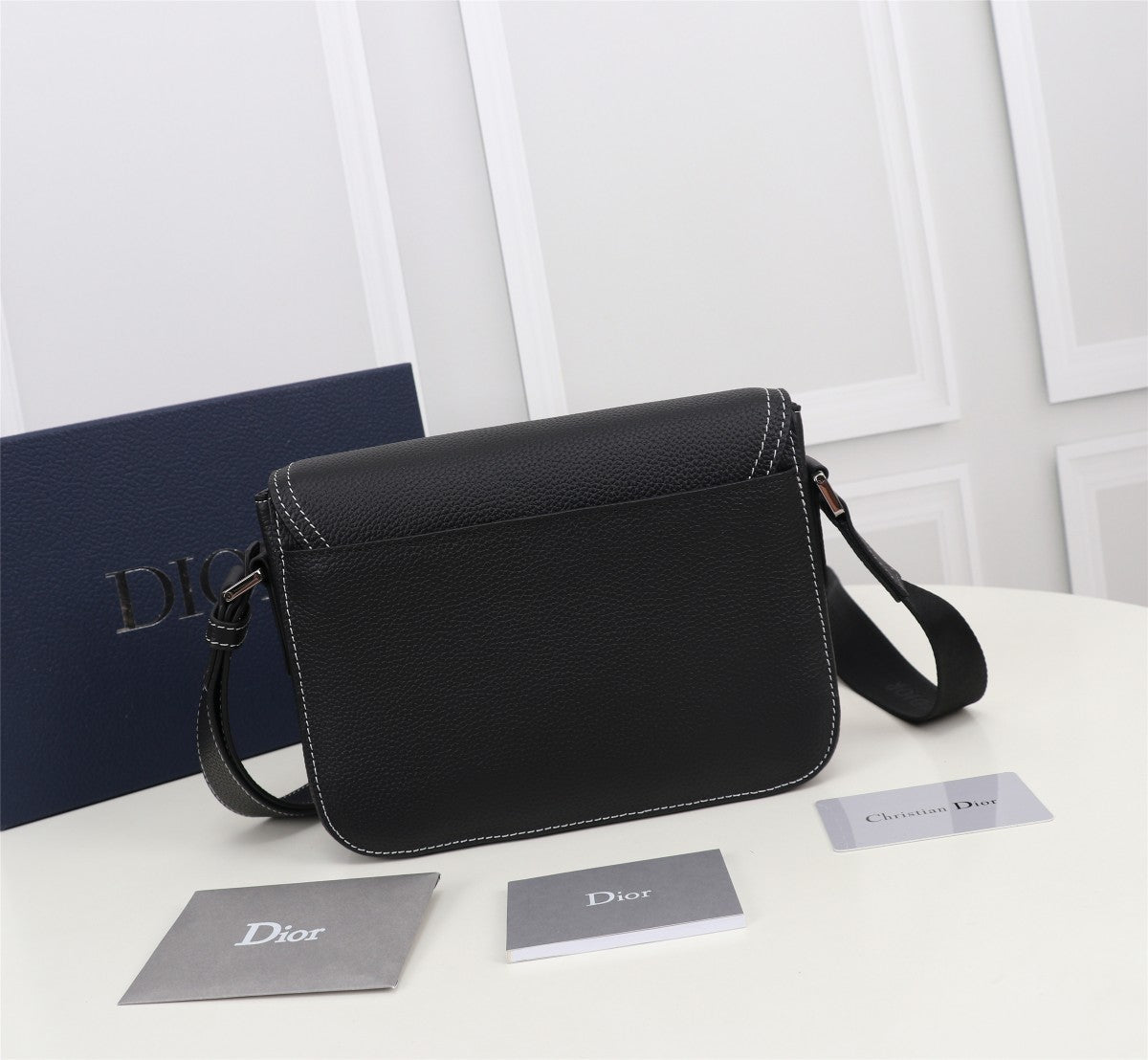 Dior Black Leather Crossbody Bag with Contrast Stitching and Buckle Clasp