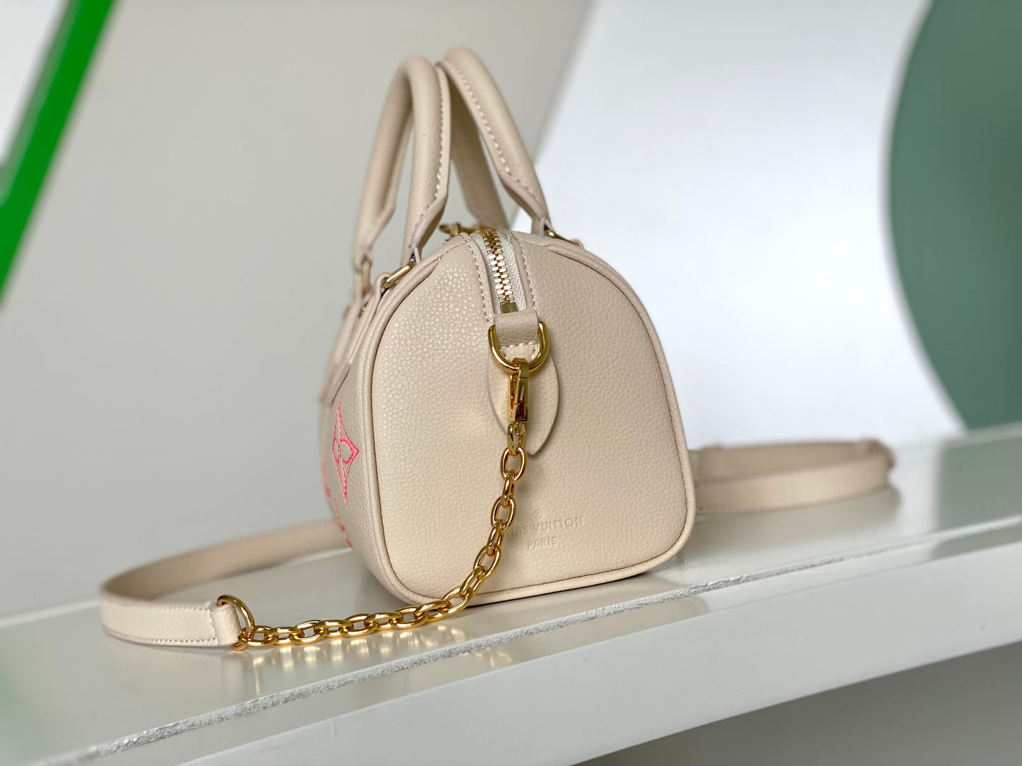 Louis Vuitton Elegant Pastel Pink Leather Monogram Handbag with Chain Strap