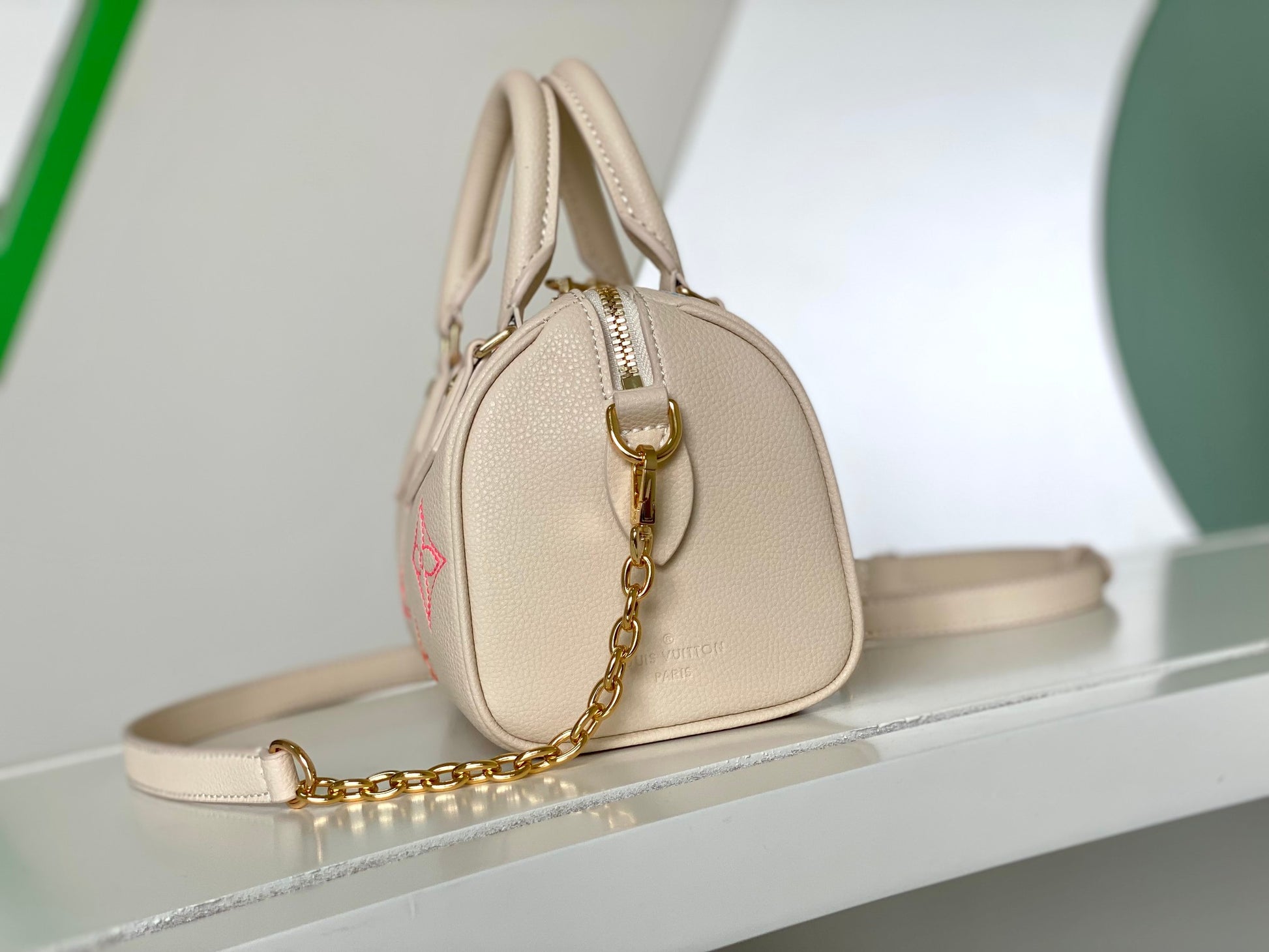 Louis Vuitton Elegant Pastel Pink Leather Monogram Handbag with Chain Strap