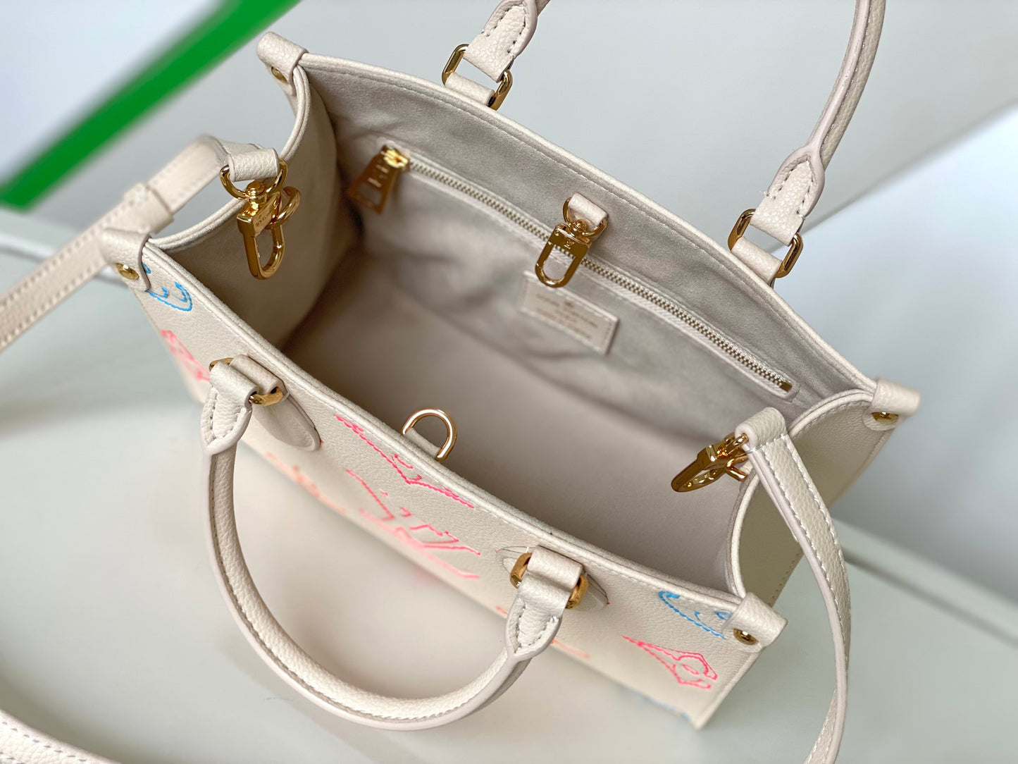Louis Vuitton Luxury Pastel Pink Leather Tote Bag with Embossed Floral Pattern