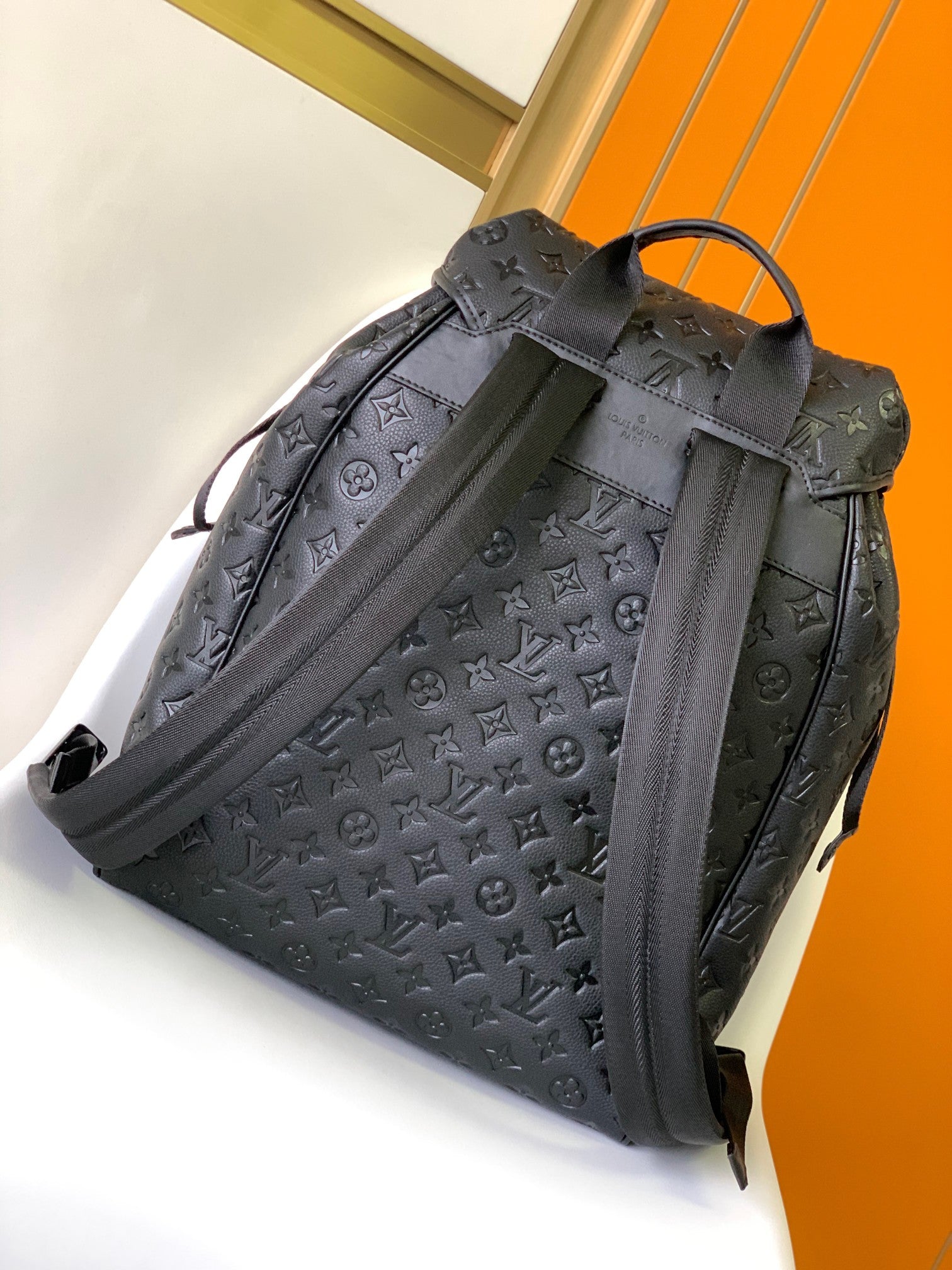 Louis Vuitton Matte Black Embossed Monogram Leather Backpack with Buckle Flap