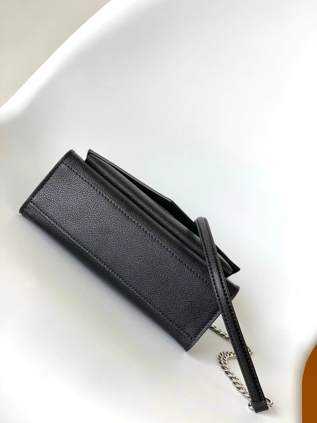 Louis Vuitton Elegant Black Leather Envelope Handbag with Silver Chain Strap