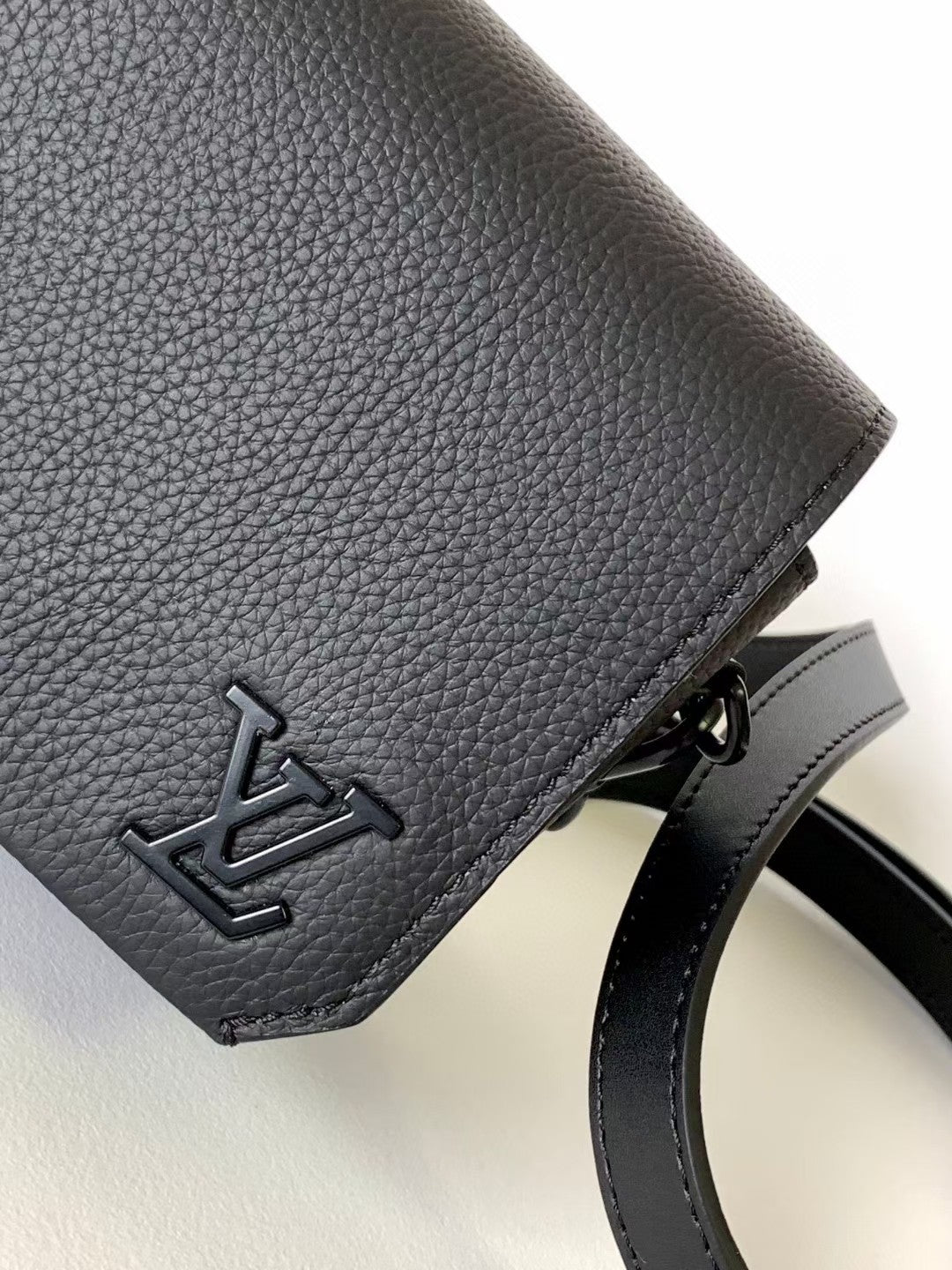 Louis Vuitton Sleek Black Leather Crossbody Bag with Adjustable Strap