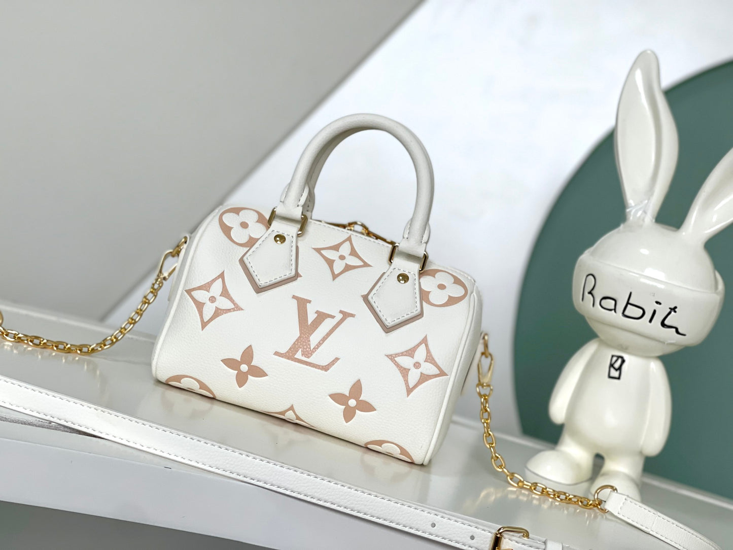Louis Vuitton Elegant Beige Embossed Leather Mini Crossbody Bag with Top Handle