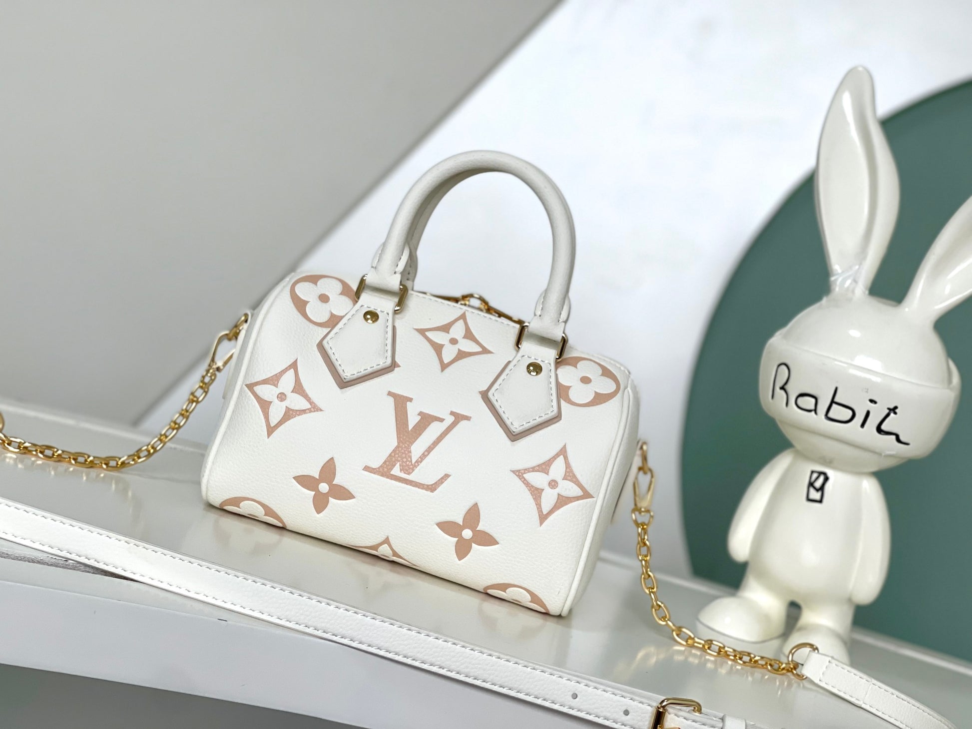 Louis Vuitton Elegant Beige Embossed Leather Mini Crossbody Bag with Top Handle