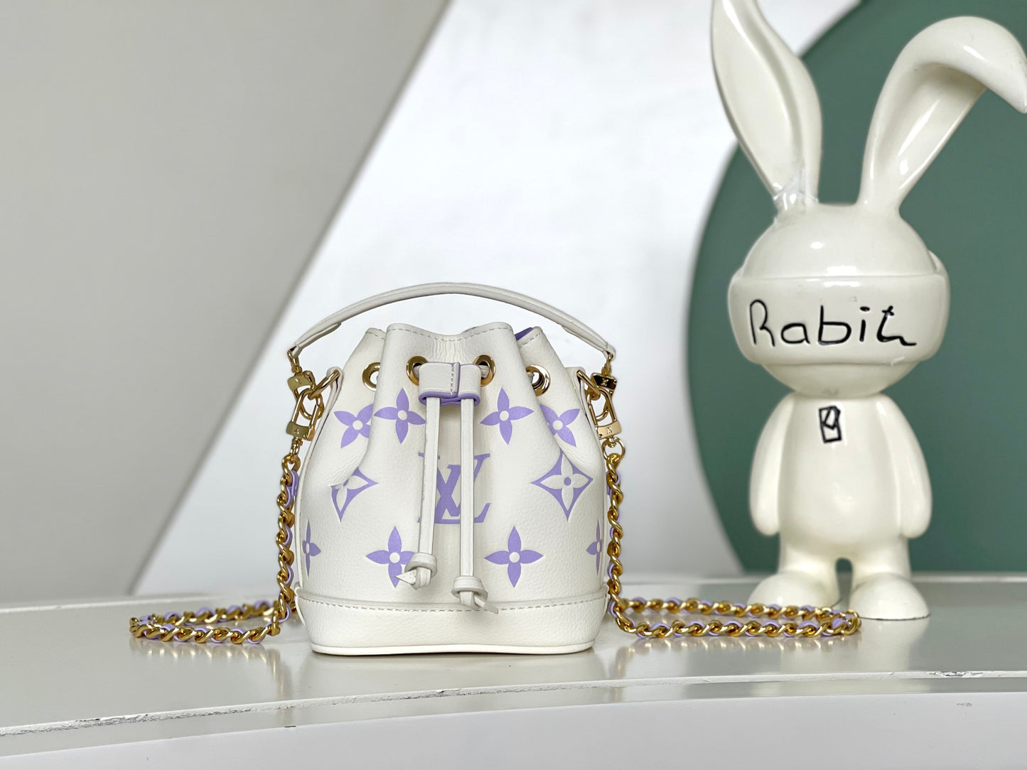 Louis Vuitton Elegant Purple Monogram Mini Drawstring Bucket Bag with Chain