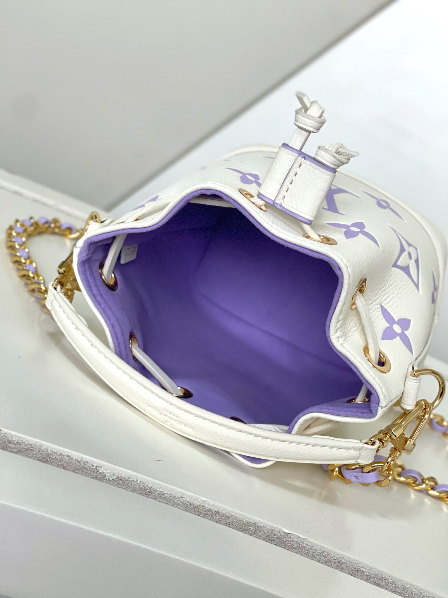 Louis Vuitton Elegant Purple Monogram Mini Drawstring Bucket Bag with Chain