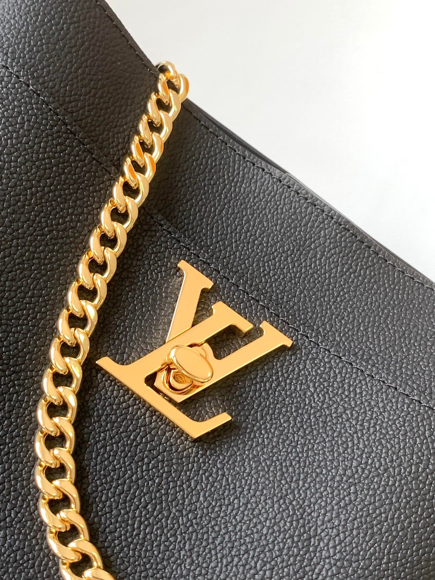 Louis Vuitton Black Leather Crossbody Bucket Bag with Gold Chain Strap