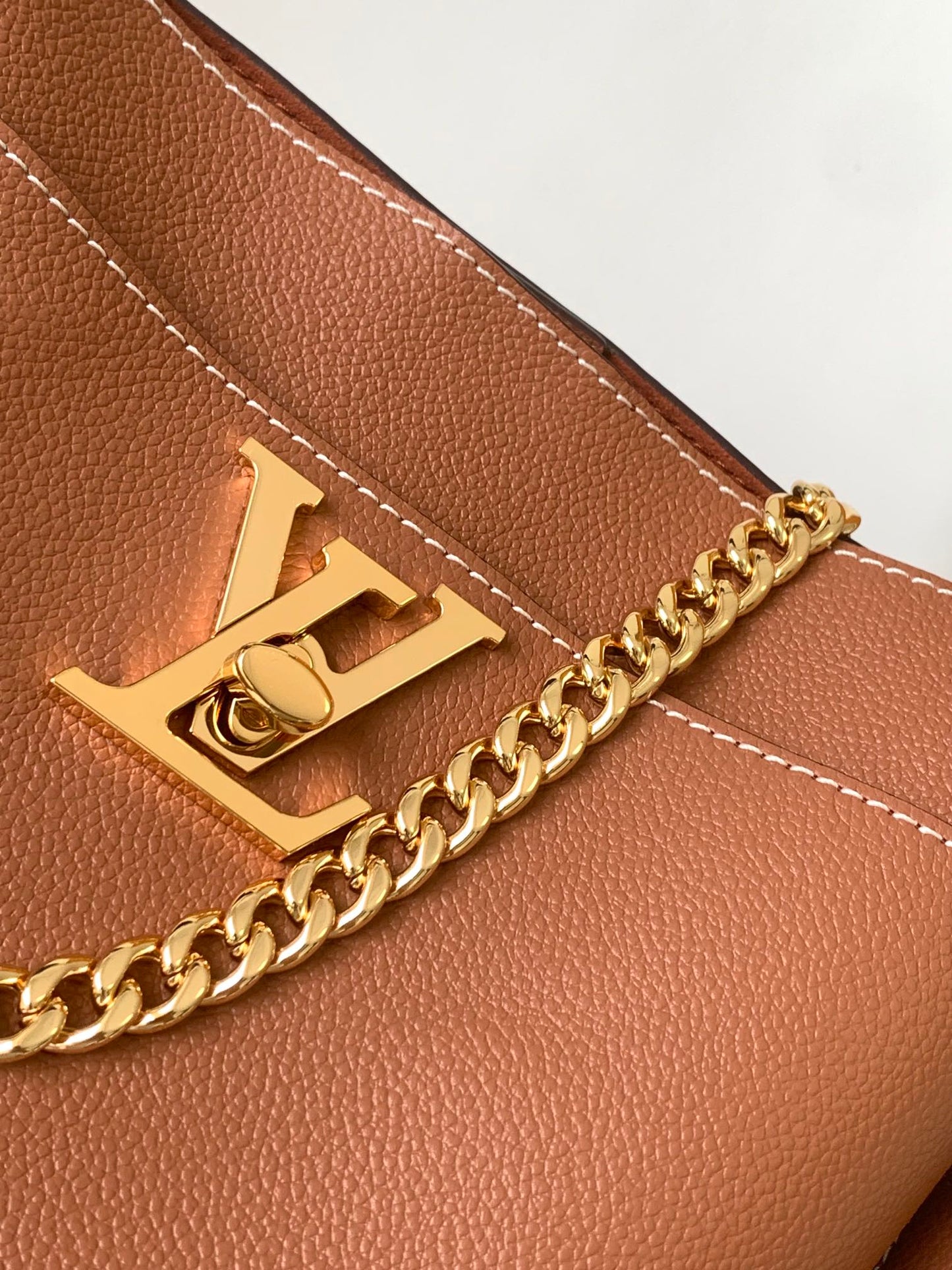 Louis Vuitton Classic Brown Leather Bucket Bag with Gold Chain Shoulder Strap