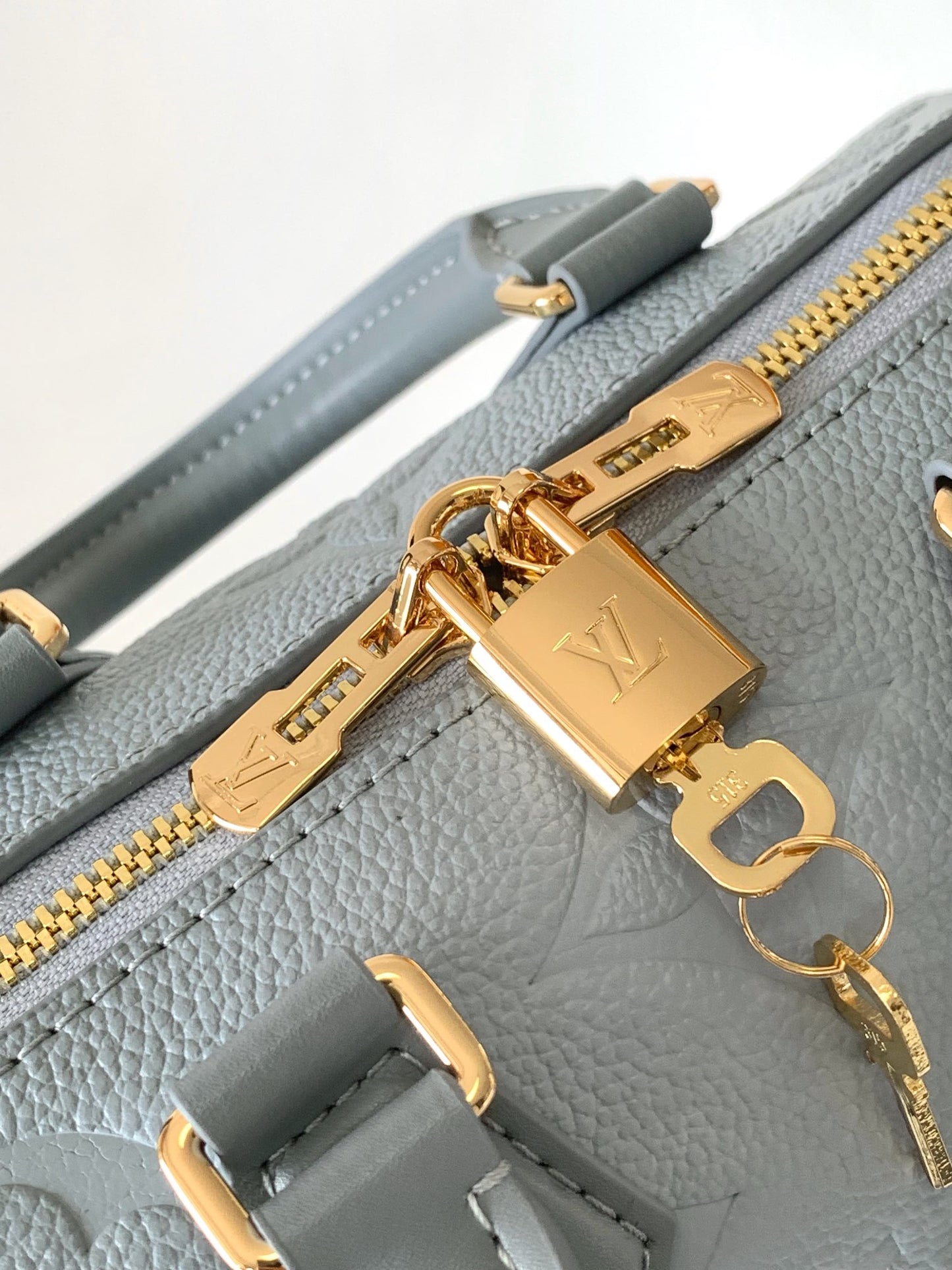 Louis Vuitton Pastel Blue Embossed Leather Top Handle Crossbody Satchel