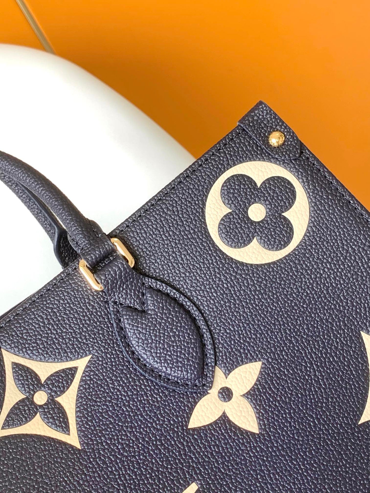 Louis Vuitton Elegant Navy Blue Leather Tote Bag with Floral Monogram Pattern