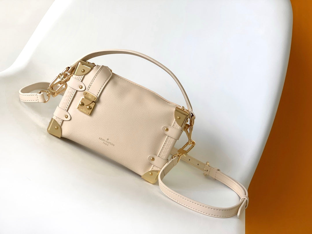 Louis Vuitton Elegant Cream Leather Trunk Shoulder Bag with Gold Hardware