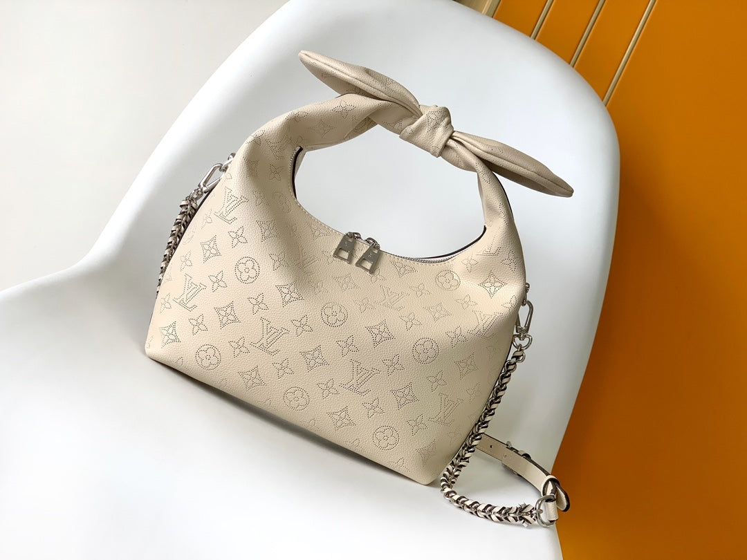 Louis Vuitton Pink Perforated Leather Hobo Bag with Bow Handle and Chain Strap