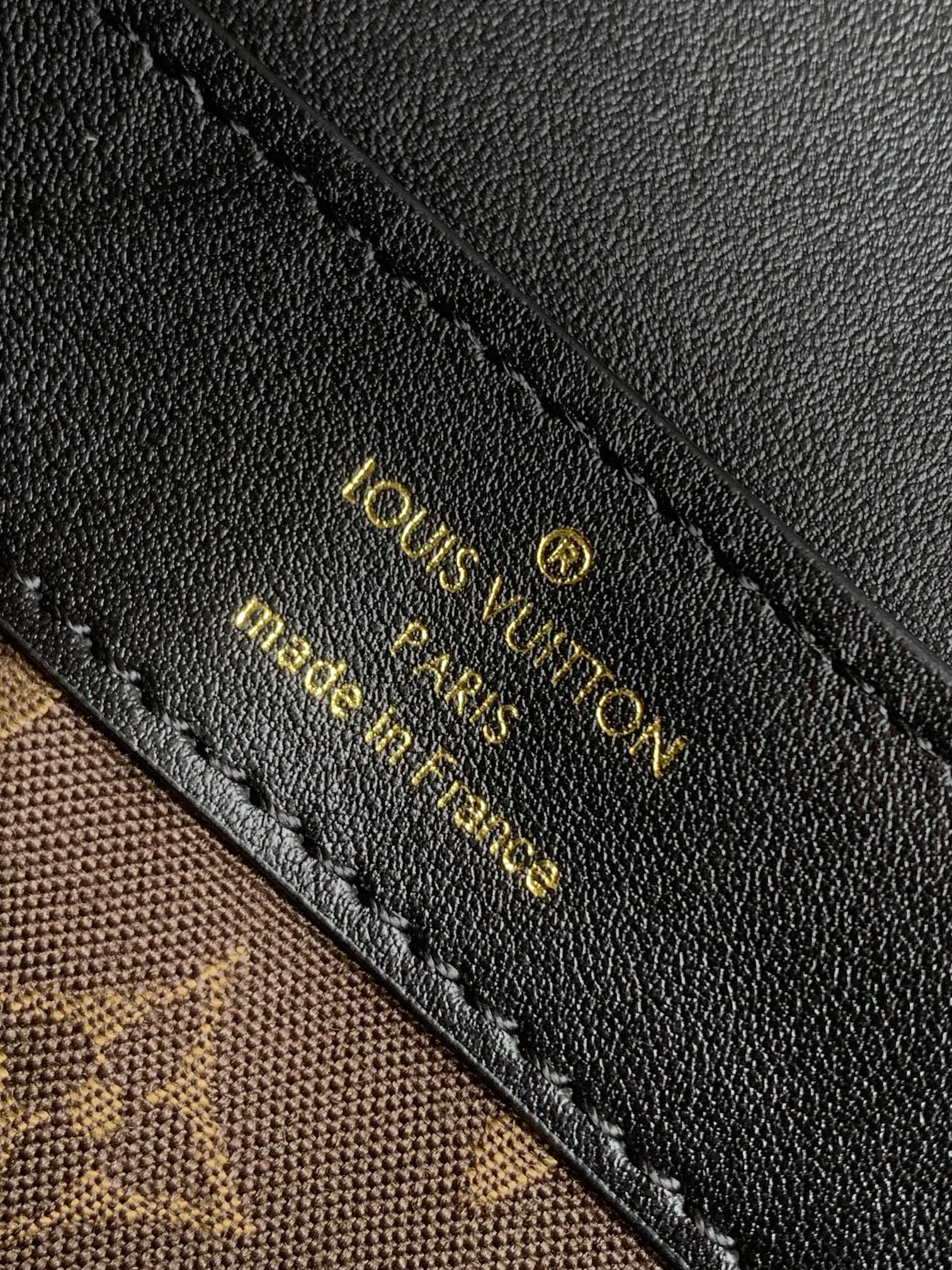 Louis Vuitton Elegant Black Faux Leather Crossbody Bag with Gold Chain Strap