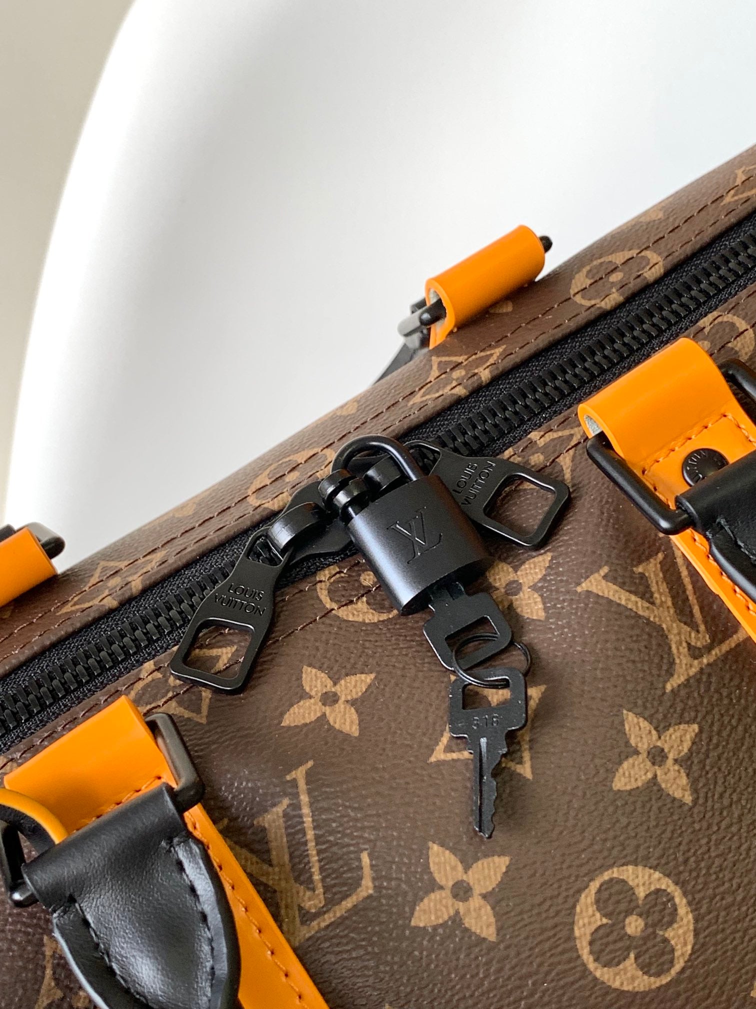 Louis Vuitton Luxury Monogram Canvas Travel Duffle Bag with Orange Straps