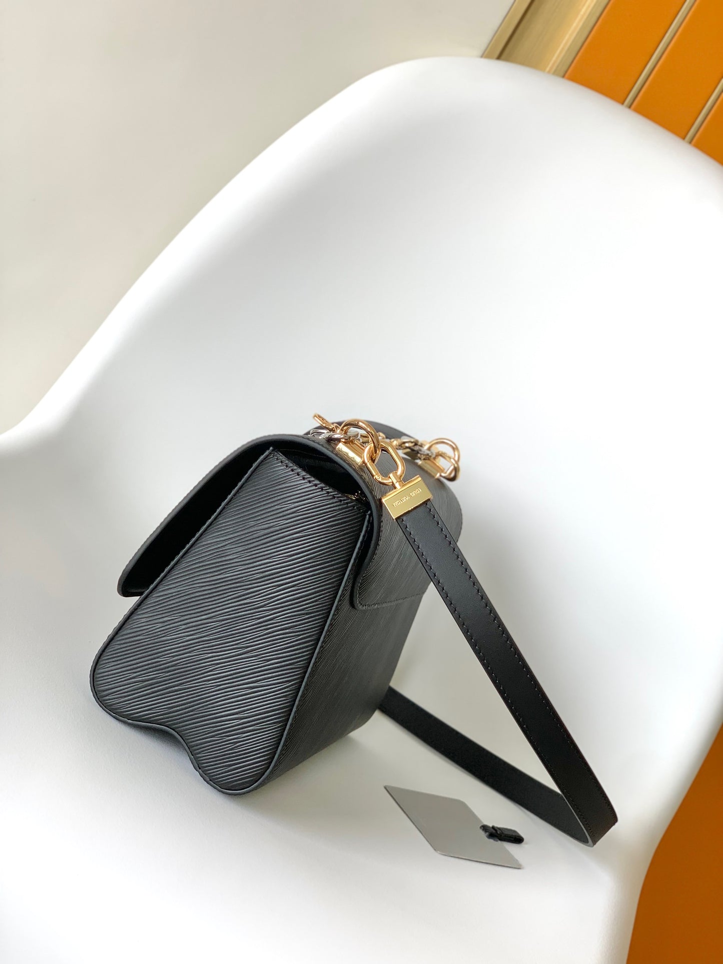 Louis Vuitton Luxury Black Leather Shoulder Bag with Two-Tone Metallic Clasp