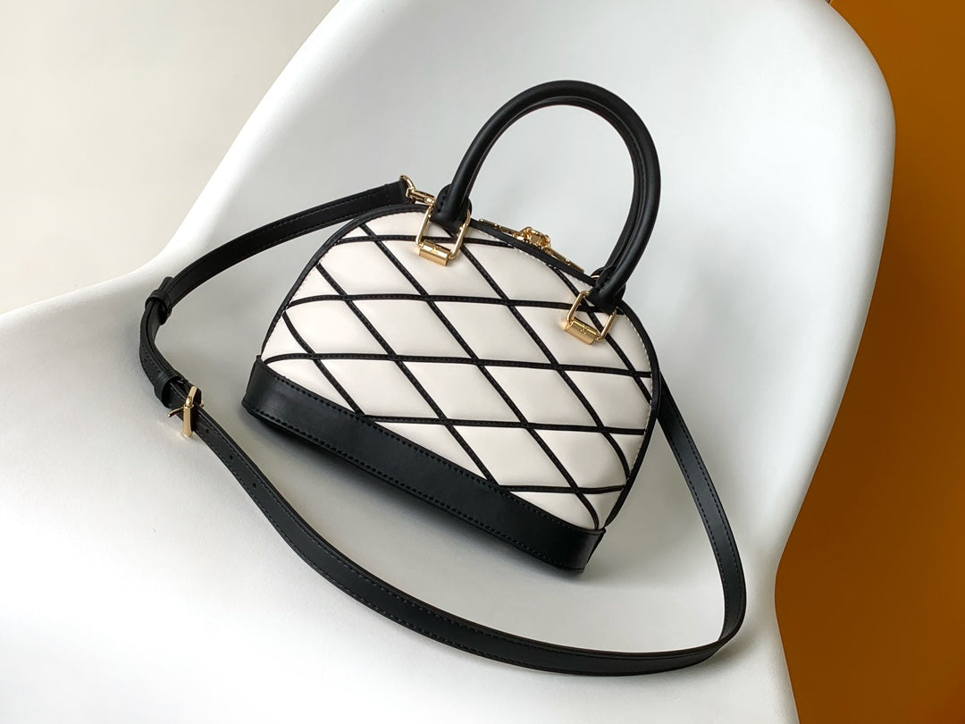 Louis Vuitton Elegant Black and White Diamond Lattice Dome Satchel Bag