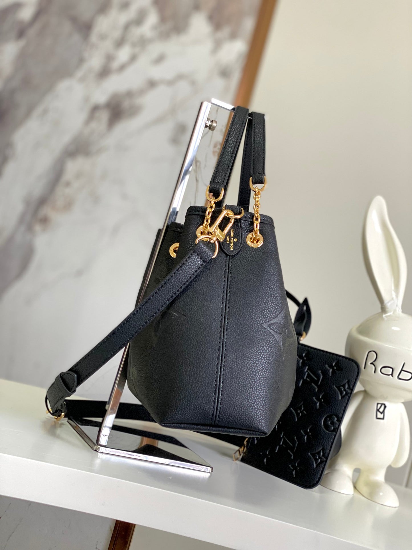 Louis Vuitton Elegant Black Embossed Leather Drawstring Shoulder Bag