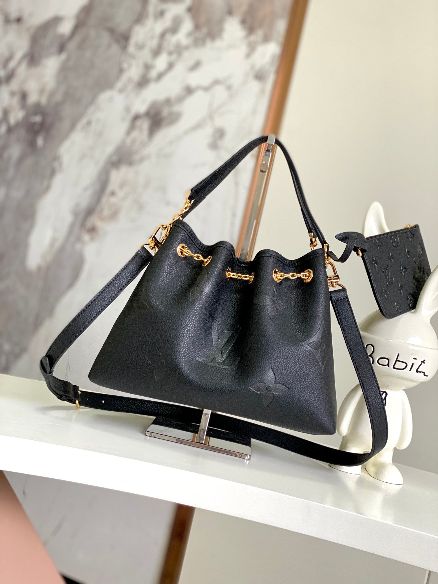Louis Vuitton Elegant Black Embossed Leather Drawstring Shoulder Bag