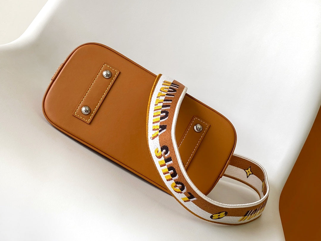 Louis Vuitton Textured Tan Leather Dome Handbag with Wide Crossbody Strap
