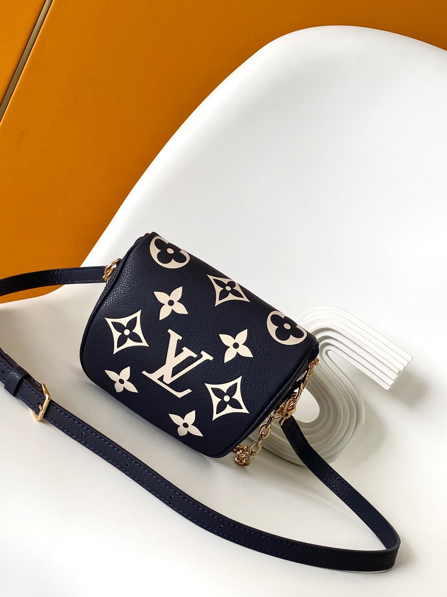 Louis Vuitton Navy Blue Leather Belt Bag with Gold Chain Strap and Floral Design