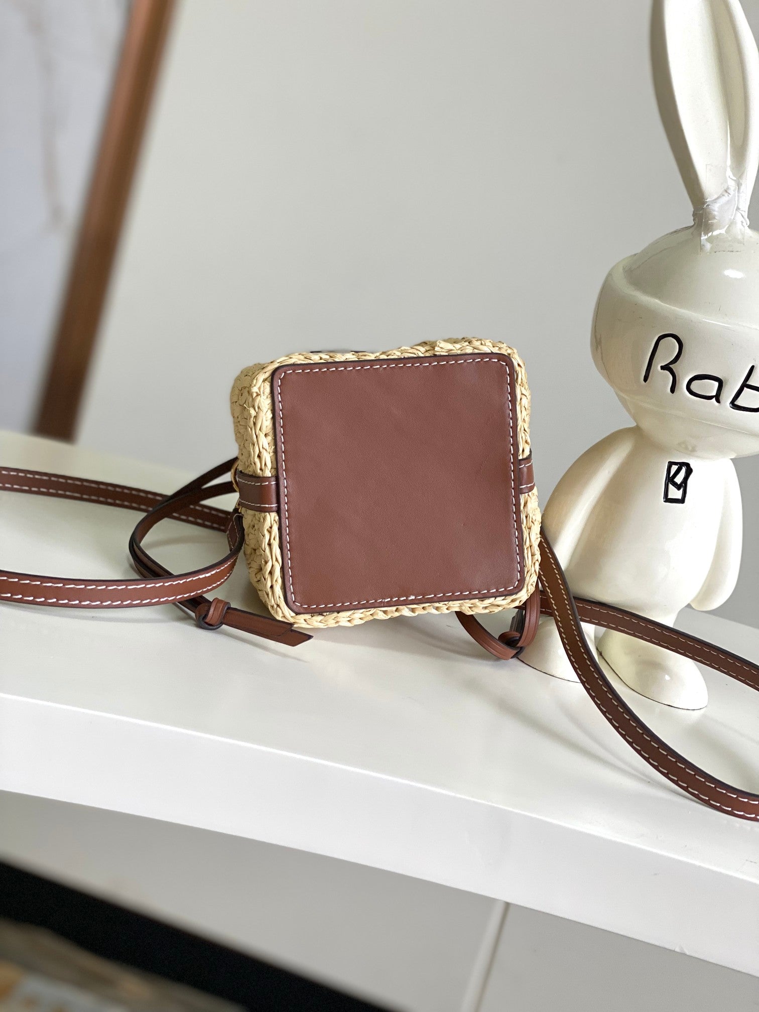 Louis Vuitton Woven Straw Crossbody Bucket Bag with Brown Leather Details