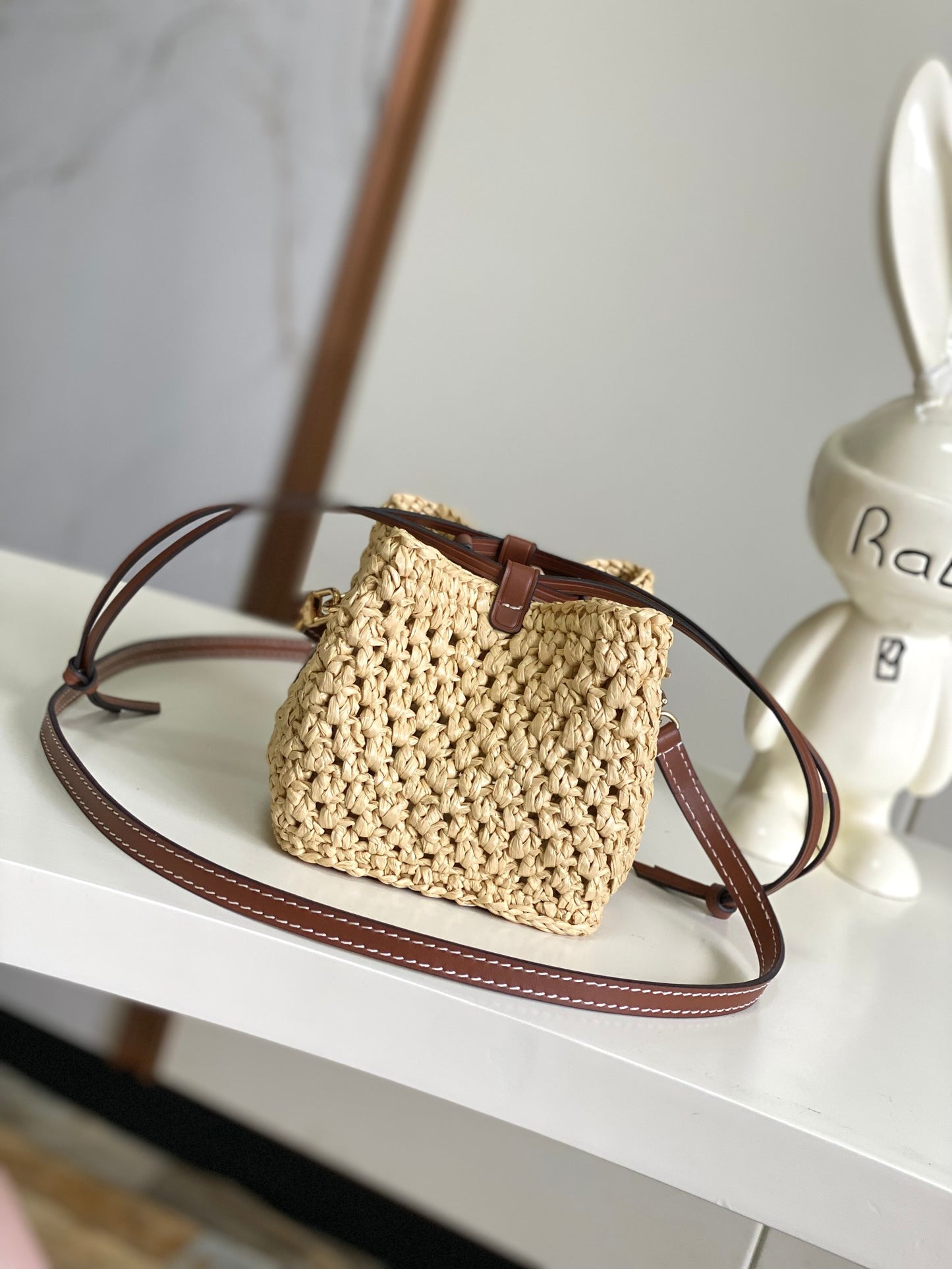 Louis Vuitton Woven Straw Crossbody Bucket Bag with Brown Leather Details