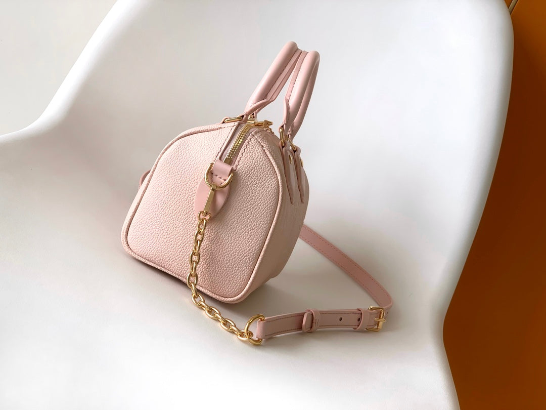 Louis Vuitton Elegant Pastel Pink Embossed Leather Top Handle Satchel Bag
