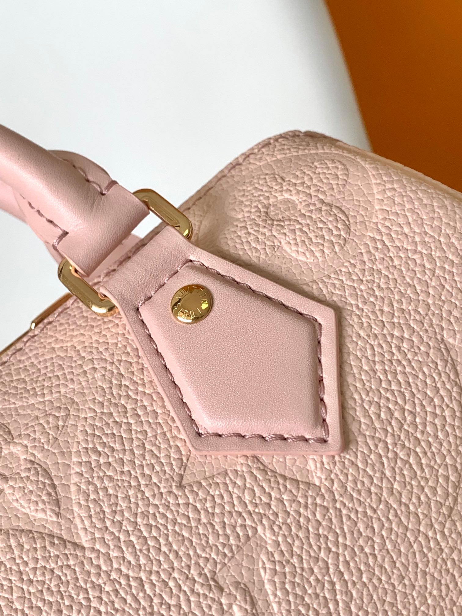 Louis Vuitton Elegant Pastel Pink Embossed Leather Top Handle Satchel Bag